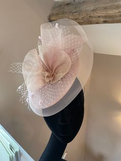 Beautiful blush pink Sinamay saucer trimmed with crinoline, veiling and a Sinamay flower decoration. Perfect for the races and weddings. Elegant Spring Party Veil, Summer Wedding Fitted Veil, Tulle Fascinator For Evening And Kentucky Derby, Tulle Fascinator For Kentucky Derby Evening, Tulle Fascinator For Royal Ascot, Elegant Evening Bridal Accessories In Tulle, Elegant Evening Bridal Accessories With Tulle, Elegant Tulle Bridal Accessories For Evening, Elegant Evening Tulle Bridal Accessories