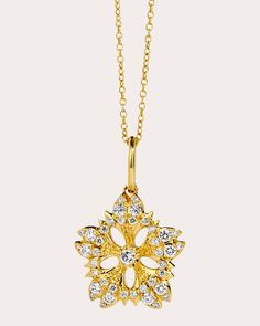 Suspended from a delicate chain, this 18-karat gold pendant is intricately carved into an openworked floral shape. Brilliant-cut diamond accents create ambient shimmer. From Syna Jewels’ Jardin Collection, inspired by the grounding properties of Earth’s natural kingdom. Lobster claw clasp 18k yellow gold and diamond Diamond carat: 0.4 ctw Diamond color: K Diamond clarity: SI2 Diamond cut: round brilliant Polish with soft cloth Stones sourced from India Made in Thailand Measurements Chain length: 18in | Syna Jewels Women's Diamond Jardin Flower Pendant Necklace in Yellow Gold Diamond Flower Pendant, Flower Pendant Necklace, Delicate Chain, Diamond Flower, Women Diamond, Flower Pendant, Diamond Clarity, Diamond Cut, Brilliant Cut Diamond