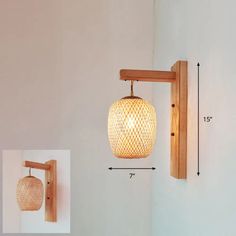 a wall mounted light with a wooden frame on the side and measurements for each bulb