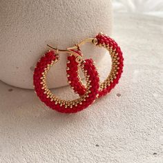 💖 Add a pop of color to your outfit with these red & gold seed bead hoop earrings! These beaded hoop earrings are perfect for adding a touch of fun to any look, whether you're dressing up for Halloween or looking for a unique Christmas gift for your best friend. Stand out from the crowd and show off your unique style with these eye-catching earrings! These handmade hoop earrings are not only stylish but also comfortable to wear all day long * MATERIALS * Hoops are made of high quality Japanese Trendy Handmade Hoop Beaded Earrings, Trendy Colorful Beaded Hoop Earrings For Gifts, Trendy Hoop Beaded Earrings As Gift, Trendy Handmade Round Hoop Earrings, Trendy Red Nickel-free Hoop Earrings, Handmade Red Beaded Hoop Earrings, Small Hoop Handmade Earrings As Gift, Trendy Handmade Small Hoop Earrings, Red Small Hoop Earrings For Summer