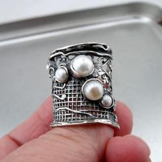 NEW silver gorgeous Ring from Hadar Jewelry Nets collection with five round freshwater Pearls(6mm-3mm) inlaid in 24mm wide sterling silver net. Must see!!!   Available with many other stones. Ask me...   Leabaled ans signed 925. This beauty will sent to you with a modern recycled brown gift box. White Stone Jewelry, Square Diamond Earrings, Pearls Ring, Natural Pearl Ring, Garnet Ring Silver, Silver Pearl Ring, Sterling Silver Garnet Ring, Freshwater Pearl Ring, Natural Gemstone Ring