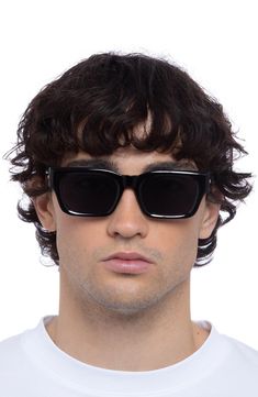 Smooth rectangular frames define these sleek sunglasses fitted with smoky-tinted lenses. 52mm lens width; 20mm bridge width; 145mm temple length 100% UV protection Plastic Imported Men Sunglasses Outfit, Aesthetic Sunglasses Men, Square Sunglasses For Men, Black Sunglasses With Uv Protection For Square Face, Black Sunglasses With Tinted Lenses For Square Face, Men Sunglasses 2024, Black Rectangular Sunglasses With Tinted Lenses, Wayfarer Shield Sunglasses With Tinted Lenses, Black Sunglasses With Tinted Lenses And Square Frame