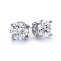 Diamond stud earrings are a staple of every woman's jewelry wardrobe. Each diamond is hand-selected, matching up two diamonds for high clarity, color, and exceptional cut. Each diamond is at least .25ct, for a total weight of a full 1/2 carat. Excellent clarity at VS2, and color G. When you are wearing these diamond studs, you will notice how well they sparkle. No ordinary diamonds here. Simple Diamond Earrings, Diamond Earrings Design, Geode Earrings, Gemstone Stud Earrings, Cz Stud Earrings, Gemstone Studs, Diamond Stud, Screw Back Earrings, Topaz Gemstone