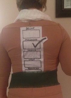 the back of a woman's shirt that has been taped to it