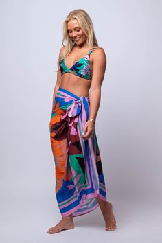 Unleash your inner beach goddess with our Ananya SARONG. Versatile and beachy, this sarong is perfect for all your summer adventures. Go from beach to bar in style with this must-have accessory. Fit Guide: One Size *available at our bandit location Cheap Beach Style Sarong For Beach Season, Cheap Beachwear Sarong For Vacation, Affordable Spring Beachwear Sarong, Cheap Multicolor Women's Sarong, Luxury Silk Sarong For Summer, Affordable Bohemian Sarong For Vacation, Summer Bohemian Sarong, Cheap Beachwear Sarong For Beach, Cheap Bohemian Sarong For Poolside