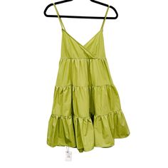 Babydoll Dress From Cider. Size Large. Tiered Ruffle Style, Spaghetti Straps, Adjustable Straps That Cross In The Back, Unlined. Brand New With Tags. Comes From A Smoke-Free, Pet-Friendly Home. Green Tiered Ruffle Dress For Beach, Green Summer Tiered Dress, Green Cotton Summer Sleeveless Dress, Green Cotton Sleeveless Summer Dress, Green Mini Sundress With Adjustable Straps, Green Ruffled Straps Sundress For Summer, Green Sundress With Ruffled Straps For Summer, Green Cotton Sundress Sleeveless, Green Tiered Summer Dress With Ruffles