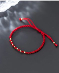 Red Thread / Red String Bracelet | Harvest Retreats Store Cheap Red Resizable Beaded Bracelets, Gold Knot Bracelet, Amulet Bracelet, Rope Bracelets, Diy Bracelets Tutorials, Good Luck Bracelet, Red String Bracelet, Thread Bracelets, Diy Bracelets Easy