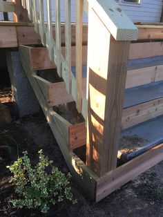 the stairs are made out of wood and have been built to match the house's exterior