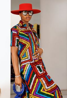 PRODUCT DETAILS: Designed in the U.S., hand-crafted in Africa Delivery within 2 weeks Multiple prints available This sophisticated unlined kaftan dress is designed with traditional African Ankara fabric shown in multi-colors. The buttoned front style is perfect for making a grand impression! Can be worn as evening wear to various events such as weddings, dinner parties and other formal occasions. Model is 5'9 CUSTOM: You pick your fabric and style @ Custom Clothes. FABRIC CARE: Dry Clean. Hand W Traditional Multicolor Tunic Dress, Multicolor Abstract Print Dress For Parties, Multicolor Printed Shirt Dress For Beach, Multicolor Printed Shirt Dress For Vacation, Beach Multicolor Printed Shirt Dress, Multicolor Batik Print Dress For Party, Multicolor Batik Print Party Dress, Multicolor Shirt Dress For Vacation, Traditional Printed Short Sleeve Dress