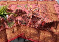 Kalamkari Saree/Fall And Saree Edges Are Done/Ready to where /Soft Silk Floral Digital Print/Big Border/Multi Dork Pink Color/Indian Saree  Style, Kalamkari Digital Print Soft Silk Light Weight Party where Dally where Occasion,  DETAILS:  Blouse Piece: One Saree and One blouse Pice/ Fall:  DONE, Stitched Already  Edges:  DONE, Saree Edges Stitched Already Material Soft Silk Kalamkari Design,11 (inch Gold Border  Saree weight: 1lb (500 g)  Meters ; Saree Dimensions: 208 inches (5.283meters) long. Blouse Piece Dimensions:  by 44 inches Long wide 25 ( meters).  Saree color: Dork Pink/ Mutti Colar All over Saree  Pallu color: Dork Pink /Brit Pink Border color: Red Pink  Blouse piece color: Pink Red  Flower Print  PRODUCT CARE: - Dry-clean or hand-wash. Do not machine-wash. Recommend spot-testi Pink Kalamkari Print Saree, Pink Bollywood Saree With Kalamkari Print, Pink Art Silk Saree With Kalamkari Print, Pink Unstitched Kalamkari Traditional Wear, Unstitched Pink Kalamkari Traditional Wear, Semi-stitched Bohemian Pink Saree, Pink Semi-stitched Bohemian Saree, Pink Kalamkari Traditional Wear For Navratri, Pink Bohemian Semi-stitched Saree