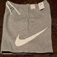 New! Mens Nike Sportswear Fleece Lined Sweatshort. Grey And White Color Way. Mens Size Xxl Waist 18.5 Inseam 9. Drawstring And Two Hand Pockets. Pristine Condition. See All Photos Nike Fleece Shorts Outfit, Sporty Fleece Sports Shorts, Sporty Fleece Shorts For Sports, Comfortable Nike Athletic Shorts, Athleisure Moisture-wicking Athletic Shorts For Leisure, Nike Cotton Sweats For Sports, Casual Fleece Sports Shorts, Moisture-wicking Sportswear Athletic Shorts For Leisure, Nike Fleece Moisture-wicking Activewear