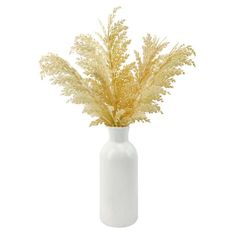 a white vase with some yellow flowers in it