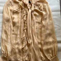 Beautiful Silk Blouse Tan In Color, Excellent Condition !!! Never Worn Silk Size 8 Silk Office Blouse With Ruffles, Elegant Spring Tie Neck Blouse, Elegant Beige Tie Neck Blouse, Sheer Silk Long Sleeve Blouse, Beige Silk Blouse For Evening, Chic Ruffled Silk Chiffon Blouse, Beige Silk Blouse For Evening Wear, Elegant Beige Daywear Blouse, Feminine Silk Chiffon Blouse For Spring