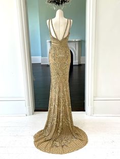 Transform into a regal #beauty in our C44307 gown. The stunning sleeveless design features intricate #gold beading, a flattering v-neckline, and an elegant empire waistline. Perfect for #pageants and #special occasions, this #dress will make you feel like a true queen. Get this Sleeveless gold beaded #pageant gown with v-neck and empire waist line created as shown or with ANY changes. Our #design firm can also make inspired recreations of any of the #pageantdresses you #love on the internet for Pageant Gown, Waist Line, Empire Waistline, Pageant Gowns, Pageant Dresses, Gown Dress, Gold Beads, Empire Waist, Make You Feel