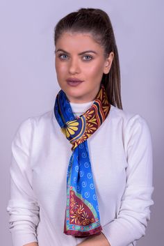 A blue silk scarf that is made from pure silk in Soufli, Greece by Kalfas. We design beautiful silk scarves. Creating with passion excellent quality silk scarves. Ancient Greece is our inspiration! Here are our Product details: Fabric : Crepe Satin 16m/m Dimension : 47cm x170cm Weight : 57gr Print : Digital Finished : by hand * Gift box included Our silk products are handmade and printed. These scarves for women are 100% Pure Silk Woman Handmade Printed Scarf. We design and create in our factory Blue Satin Scarves, Blue Satin Silk Scarf As Gift, Blue Satin Silk Scarf For Gift, Traditional Blue Silk Scarves, Traditional Blue Silk Scarf, Traditional Blue Scarf As Gift, Elegant Blue Satin Silk Scarf, Bohemian Blue Silk Scarf For Gift, Bohemian Blue Silk Scarf As Gift