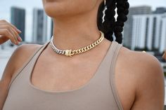 "This is a one-of-a-kind curb choker that is so unique you have to buy it just to have it! One side of this choker is white gold, and the other is 18k gold filled with a beautiful gold box clasp to secure the piece nicely! Measurements/Specs: - 14.5\" Thick Link Choker - 11mm Thick - Color is split right down the middle 🌼Check out the matching Bracelet Here: https://bit.ly/Cubanbracelets This piece looks beautiful alone or mixed and matched! 🌺 Care Instructions: -We always recommend anything t Cheap Cuban Link Metal Chain Necklace, Luxury Silver Cuban Link Box Chain Necklace, Luxury Tarnish-resistant Cuban Link Necklace, Gold Cuban Link Necklace With Curb Chain For Streetwear, Gold Curb Chain Choker, Gold Chain Link Choker With Curb Chain, Trendy Curb Chain Jewelry For Casual Wear, Trendy Streetwear Jewelry With Curb Chain, Cuban Link Curb Chain Necklaces For Streetwear