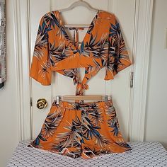 Tropical 2pc Romper Set Sz Large (8-12 Womens) Elastic Waist Short With Matching Halter Top Cut Out With Short Flowy Sleeves. Top Is So Adjustable With Ties Like Swim Wear. Shorts Measure: 14in To Stretched 20in Across Front,Elastic Waist (Fits28 To 38 Waist) Hip Measures:23 " Across Front ( Fit Up To 45) Super Cute Fringe Legs. Look Cute On Your Vacay, Cruise, Caribbean ,Tropical Destinations Or Summer Parties! Hawaii Luau Bin#M Aqua Fitted Casual Set For Vacation, Orange V-neck Summer Set, Trendy 2-piece Beach Set, Spring Vacation Fitted Two-piece Set, Casual Floral Print Sets For Day Out, Fitted Two-piece Set For Vacation In Spring, Casual Two-piece Set For Vacation, Fitted Two-piece Set For Spring Vacation, Two-piece V-neck Beach Set