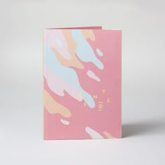 a pink and blue notebook with the words don't be afraid on it