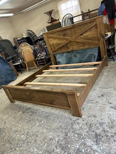 the bed frame is made up and ready to be put into the room with other furniture