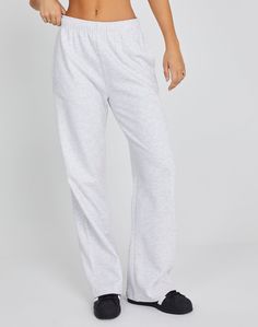 These sweatpants feature a mid rise waist, wide leg fit and an elastic waist. Leisure Pants With Ribbed Waistband, Relaxed Fit Full Length Sweatpants For Elevated Casual Wear, Elevated Casual Full-length Sweatpants With Elastic Waistband, Full Length Sweatpants For Elevated Casual Look, Elevated Casual Full-length Relaxed Fit Sweatpants, Sporty Relaxed Fit Wide Leg Sweats, Sporty Wide Leg Sweats With Relaxed Fit, Sporty Wide Leg Relaxed Fit Sweats, Fall Wide Leg Joggers With Comfort Waistband