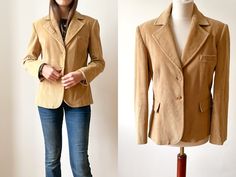 "A fabulous beige corduroy blazer in like new condition. Made of 98% cotton and 2 % Spandex this beige blazer features a notched collar, front button fastening and two front flap pockets and is fully lined. The blazer is labeled by German luxury brand Bloom in Italian size 44. It's in near as new condition, ready to wear, becoming a classic staple piece. Measurements:  ITEM DETAILS: Material: 98 % cotton, 2% Spandex, Inner lining 100 Viscose Colour: Light beige  Fastening: 2 single breasted butt Beige Blazer, Corduroy Blazer, Tailored Blazer, Womens Blazers, Notched Collar, Shearling Jacket, Staple Pieces, Light Beige, Luxury Brand