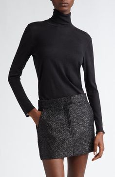 Tom Ford's tasteful elegance pervades this trim turtleneck sweater knit in Italy from silk-softened cashmere with finely ribbed trim. 23 1/2" length (size Medium) Turtleneck Long sleeves Ribbed cuffs and hem 70% cashmere, 30% silk Dry clean Made in Italy Designer Clothing Elegant Black Wool Top, Elegant Mock Neck Turtleneck Top For Winter, Luxury Fine Knit Winter Tops, Elegant Stretch Cashmere Sweater, Chic Turtleneck With Fine Knit And Funnel Neck, Chic Turtleneck With Funnel Neck In Fine Knit, Chic Fine Knit Turtleneck With Funnel Neck, Chic Fitted Fine Knit Turtleneck, Elegant Fitted Fine Knit Sweater