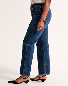 Elevate your wardrobe with the timeless elegance of Abercrombie & Fitch's Women's High Rise Vintage Straight Jeans. These jeans are a perfect blend of classic style and modern comfort, tailored to enhance your silhouette.

- Size: 31 LONG
- Color: Dark
- Material: Pocket Bag - Polyester, Cotton Blend
- Gender: Female
- Fit: High rise (10.5”), relaxed at the waist and hips, straight-leg shape
- Features: Clean hem, vintage stretch fabric for comfort with an authentic vintage look

Ideal for any o Dark Wash Cropped Jeans With Straight Fit And Hem, Dark Wash Cropped Jeans Straight Fit, Classic Dark Wash Flare Jeans For Work, Classic High Rise Flare Jeans, Dark Wash Straight Cropped Mom Jeans, Classic Mid-rise Dark Wash Flare Jeans, Everyday Dark Wash Cropped Jeans With Standard Cut, Everyday Dark Wash Cropped Jeans With Standard Cut Leg, Classic Straight Cropped Jeans In Medium Wash