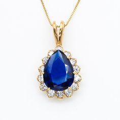 Gold Sapphire Pendant set with a created Sapphire in a flawless diamond cut & royal blue color, at 16x12mm, 10 Carats. Surrounded by top grade CZ Diamonds Teardrop Pendant made of Gold Vermeil ☞ thickest 18k Gold Plating on top of Solid 925 Sterling Silver ☞ made to last. Matching Ring: www.etsy.com/uk/listing/780193095 Matching Earrings - please ask me   Details :  ♥ Each item comes in a cute GIFT BOX ✓ ♥ GUARANTEE on the materials ✓ ♥ Created Sapphire - perfect diamond cut & tear drop shape & Blue Drop Jewelry With Diamond Accents, Blue Teardrop-shaped Jewelry With Diamond Accents, Blue Teardrop Jewelry With Diamond Accents, Blue Pear-shaped Diamond Jewelry, Pear-shaped Blue Diamond Jewelry, Blue Diamond Teardrop Necklace, Blue Pear-shaped Sapphire Jewelry, Blue Teardrop Pendant Jewelry For Formal Occasions, Blue Teardrop Pendant For Formal Occasions