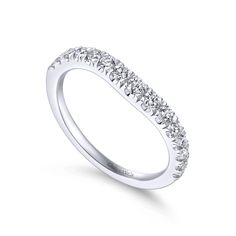 a white gold wedding band with rows of diamonds