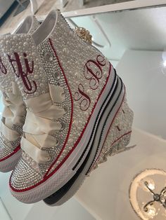 These beautiful sneakers are handmade to order with hand placed pearls and rhinestone crystals of the highest quality.  Order for a wedding party or bride. These shoes are fully customizable with your choice of color crystals or text. Each pair comes with a small repair kit and a pair of satin laces. PLEASE FOLLOW THESE STEPS TO ENSURE THAT YOUR SHOES ARE EXACTLY HOW YOU ORDER. I provide the classic All-Star unisex Converse sneaker. Note these sneakers run big and I highly recommend you try on the shoe in your local area if you are not sure of the fit.  All orders are custom and non-returnable/refundable.  Please note this is a custom items and will take 4-6 weeks for delivery. Sneaker Ball Wedding, White Custom Sneakers With Rhinestones For Wedding, Wedding Custom Sneakers With Rhinestones And Round Toe, Custom Wedding Sneakers With Rhinestones, Sneakers For Wedding, Wedding Converse Shoes, Wedding Tennis Shoes, Bedazzled Converse, Nye 2024