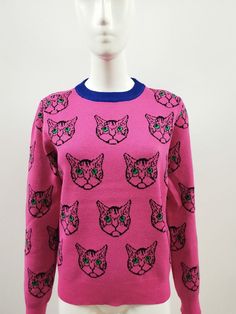 Elevate your cold weather wardrobe with our stylish women's sweater featuring adorable cats and long sleeves. Made with warm and comfortable fabric, this sweater is perfect for any occasion. Stay cozy and on-trend with this fashionable addition to your closet. Pattern Type: Cartoon Clothing Length: Regular Material: Polyester Material: Acrylic Collar: O-Neck Origin: US(Origin) Season: Spring/Autumn Decoration: NONE Sleeve Length(cm): Full Sleeve Style: Regular Thickness: STANDARD Style: Casual P Trendy Knit Sweatshirt, Fitted Crew Neck Sweatshirt For Fall, Soft Knit Stretch Long Sleeve Sweater, Winter Long Sleeve Stretch Sweater, Winter Stretch Long Sleeve Sweater, Stretch Long Sleeve Winter Sweater, Stretch Long Sleeve Sweater For Winter, Pink Long Sleeve Sweater With Ribbed Cuffs, Winter Long Sleeve Tops With Cat Print