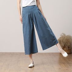 "Cool and comfortable for hot summer days, this blue wide leg pants is elegant and stylish.    It is a wonderful wardrobe staple that's a timeless classic you'll wear again and again.  All our items are Tailored and Handmade and Made to Order ,I can make Any Size . I design new styles every week, please collect my store. I believe that you will meet your favorite styles. ★★FEATURES 100% cotton Two side pockets Back elastic waist Wide leg pants Blue pants Casual pants Long pants Loose pants Plus Trendy Blue Relaxed Fit Wide Leg Pants, Trendy Blue Wide Leg Pants With Relaxed Fit, Spring Wide Leg High-waist Pants, Spring Baggy High Waist Wide Leg Pants, Summer Straight Pants In Solid Color, Spring High Waist Baggy Wide Leg Pants, Versatile Baggy Wide Leg Pants For Spring, Versatile Harem Pants For Spring, Chic Wide-leg Culottes For Summer