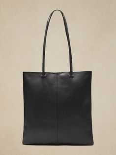 Sleek Soft Leather Tote Bag, Sleek Textured Leather Bag For Everyday, Structured Soft Leather Shopping Bag, Sleek Tote Bag For Daily Use, Sleek Daily Bags With Leather Handles, Everyday Leather Structured Bag, Textured Leather Work Tote Bag, Structured Leather Bag For Everyday Use, Workwear Shoulder Tote Bag In Textured Leather