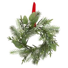 a green wreath with red ribbon hanging from it