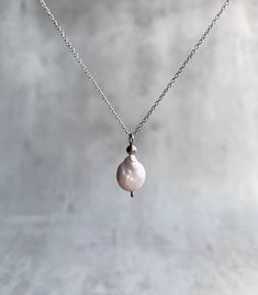 Amazing dainty necklace with baroque pearl pendant. Explore ways to layer this piece or wear it on its own for a minimal look. Dainty, minimal, stylish, lightweight choker. Great gift idea for women (wife, girlfriend, mom, sister...). Please select your necklace size from a drop-down menu from 14' (35 cm) to 24' (60 cm). To get the right necklace size for you: * Take a string or a piece of ribbon etc. * Wrap around your neck to the desired spot for wearing your necklace * Hold or mark that spot Baroque Pearl Pendant, Symbol Of Wealth, Gift Idea For Women, Dainty Choker, Delicate Chain, Pearl Pendant Necklace, Crystal Necklace Pendant, Necklace Size, Necklace Boho