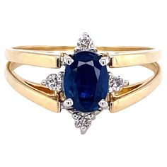 Vivid blue sapphire or a sparkling white cluster of diamonds, it's your choice. This fabulous flip ring presents both looks on demand. Offering a .75 carat (6.5 x 4mm) oval faceted sapphire accented with four round diamonds and on the reverse flip, a cluster of ten round H/VS diamonds, .46 carat total weight. Making this possible is a unique fourteen karat yellow gold 14K double ring shank that is hinged at the ring's head and easily flips to change to your desired style. In ring size 8.5. Resiz Oval Sapphire Diamond Ring With Diamond Cut, Oval Sapphire Ring With Vvs Clarity, Oval Diamond Cut Sapphire Ring Fine Jewelry, Oval Sapphire Ring With Diamond Accents In Yellow Gold, Oval Yellow Gold Sapphire Ring With Diamond Accents, Oval Sapphire Diamond Ring With Accents, Oval Sapphire Ring With Vvs Clarity In 14k Gold, Oval Sapphire Ring With Diamond Accents For Anniversary, Oval Sapphire Ring With Diamond Accents, Fine Jewelry