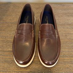 Brand New Cole Haan Grand Leather Loafer, Size 11.5. Only Worn Once. Casual Wingtip Slip-ons With Brogue Detailing, Casual Wingtip Slip-ons With Leather Footbed, Classic Brown Low-top Slip-ons, Leather Moc Toe Boat Shoes For Business Casual, Slip-on Plain Toe Boat Shoes For Business Casual, Plain Toe Slip-on Boat Shoes For Business Casual, Casual Wingtip Loafers With Leather Sole, Casual Plain Toe Moccasins With Brogue Detailing, Slip-on Boat Shoes For Business Casual