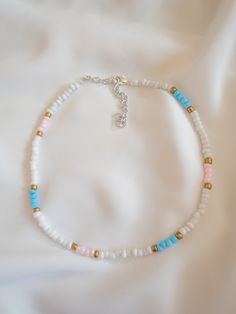 Soft pastel colored necklace with adjustable length to fit any size. Makes great gift for friends and family. Beautiful beaded necklace/ choker. It's a great piece jewelry for the summertime and even for the  cold winter months. Size of beads - 4mm Helpful tips to make sure your product lasts s long as possible: -beads are waterproof although the color will fade faster if interacts with water -string is fully waterproof White Trendy Necklace For Friendship, Trendy White Necklaces For Friendship, Adjustable Letter Beads Choker As Gift, Adjustable Letter Beads Choker Gift, Pastel Colorful Beads Necklace For Gift, Trendy Adjustable Pastel Jewelry, Pastel Beaded Necklaces With Colorful Beads As Gift, Pastel Beaded Necklaces As Gift, Pastel Beaded Necklaces With Colorful Beads For Gifts