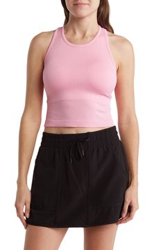 A cropped racerback tank is ribbed with extra support from a built-in bra. 18" length (size S) Scoop neck Sleeveless Racerback Ribbed Cropped Built-in bra 100% nylon Machine wash, tumble dry Imported Model stats: 5'10" height, 32" bust, 25" waist, 36" hip. Model is wearing size S. Spring Crop Top With Built-in Bra For Gym, Spring Seamless Racerback Sports Bra, Bra-friendly Crop Top Activewear For Spring, Summer Gym Ribbed Tank Top, Summer Ribbed Gym Tank Top, Ribbed Tank Top For Sports In Summer, Spring Sporty Bra Friendly Tank Top, Summer Yoga Ribbed Tank Top, Sporty Ribbed Scoop Neck Sports Bra