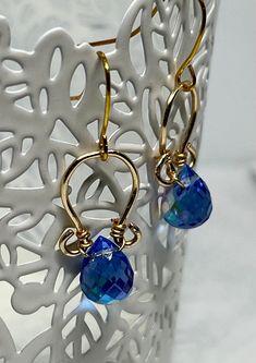 Amazing, handcrafted and unique earrings make a wonderful gift! Blue Crystal stones platinum plated earring wires We use only quality materials for our earrings.  Handmade with pride and the environment in mind. We use no plastics nor acrylics. Elegant Handmade Iridescent Earrings, Iridescent Ear Wire Earrings For Gift, Artisan Teardrop Earrings For Pierced Ears As Gift, Handmade Teardrop Hoop Earrings For Gifts, Handmade Iridescent Drop Earrings, Handmade Teardrop Hoop Earrings As Gift, Handmade Teardrop Hoop Earrings Perfect As A Gift, Artisan Teardrop Earrings As Gift, Iridescent Teardrop Earrings For Gift