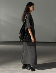 Knit-wool maxi t-shirt dress in dark grey . 89.2% sheep wool 7.6% yak wool 3.2% yak wool.Not itchy Slip on style Bust 46"/117cmLength 49"/125cmModel wears size S/M and is 5.8"/170 cmImported T Shirt Dress Maxi, Shirt Dress Maxi, Pixie Market, Maxi Shirt Dress, Midi Maxi Dress, Reduce Waste, Wool Dress, Dress Maxi, Short Jumpsuit