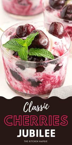 two glasses filled with cherries and ice cream on top of a white tablecloth