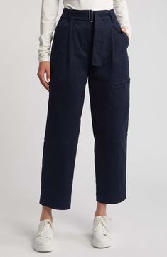 Sleek hardware elevates cropped cotton-forward pants boasting deep pockets for utilitarian flair. 26" inseam Zip fly with button closure Front slant pockets; back button-patch pocket Belt is sewn in 98% cotton, 2% polyester Machine wash, line dry Made in Turkey High Waist Cargo Jeans For Workwear With Flap Pockets, High Waist Cargo Jeans With Flap Pockets For Workwear, Cotton High-waisted Pants With Flap Pockets, Utility Style High-waist Cargo Jeans For Workwear, Utility High Waist Cargo Jeans For Workwear, High-waist Utility Cargo Jeans For Workwear, Utility Work Pants With Patch Pockets For Spring, High Waist Utility Cotton Work Pants, High Waist Cotton Utility Work Pants