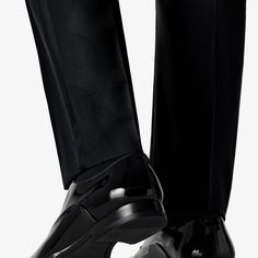 A proper tux isn't complete without a pair of classic black patent leather lace-ups. Thanks to their slim profile, our calf leather Blake-stitched shoes lend a contemporary finish to the traditional black-tie attire. Formal Patent Leather Oxfords With Pointed Toe, Formal Patent Leather Pointed Toe Oxfords, Semi-formal Fitted Patent Leather Loafers, Fitted Patent Leather Dress Shoes For Semi-formal Occasions, Sleek Patent Leather Loafers With Rubber Sole, Sleek Patent Leather Loafers With Leather Sole, Sleek Patent Leather Dress Shoes, Modern Fitted Oxfords With Pointed Toe, Semi-formal Patent Leather Dress Shoes With Pointed Toe