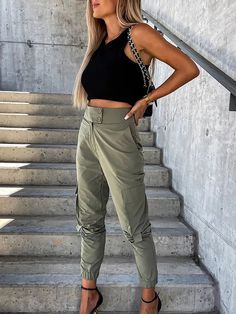 These High Waist Cargo Pants are crafted from a blend of Cotton and Polyester, ensuring durability and comfort. The button fly closure provides a snug fit, and the pocket and button details complete the look. Perfect for everyday wear. Designed by 4COLORDRESS High Waist Cargo Pants, Waist Cargo Pants, Women Lace Dress, Ribbed Knit Dress, Flowy Top, Ankle Length Pants, Black Queen, Women's Wardrobe, Clothes Collection