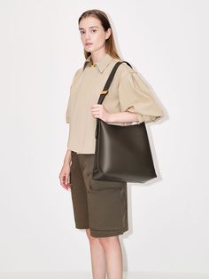 Dark Moss Edna Tote Bag - CHARLES & KEITH US Versatile Rectangular Hobo Bag For Work, Chic Olive Shoulder Bag For Travel, Versatile Everyday Box Bag With Top Handle, Versatile Bucket Bag For On-the-go, Versatile Rectangular Hobo Bag, Versatile Rectangular Everyday Bucket Bag, Versatile Daily Satchel With Detachable Handle, Versatile Satchel With Detachable Handle For Daily Use, Olive Crossbody Shoulder Bag For Everyday Use