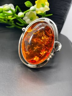 Baltic Amber Ring in sterling silver size 7 Materials: Silver 925, Baltic Amber Face of the ring: Height - 30mm, width -25mm Please note: Colors may vary slightly due to monitor display settings. Items in the photograph are not actual size. Closeup photos are taken. Please read the measurements. Thank you for visiting! PLEASE VISIT MY OTHER SHOP FOR UNIQUE HANDCRAFTED ARTISAN JEWELRY https://www.etsy.com/shop/AlenaZenaJewelry Formal Cabochon Sterling Silver Rings, Formal Sterling Silver Cabochon Rings, Sterling Silver Cabochon Rings For Formal Occasions, Formal Cabochon Ring In Sterling Silver, Formal Sterling Silver Rings With Large Stone, Formal Sterling Silver Ring With Large Stone, Luxury Amber Sterling Silver Rings, Elegant Amber Ring With Large Stone, Sterling Silver Jewelry With Large Amber Stone