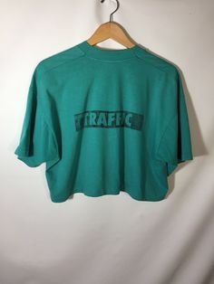 Vintage Winnipeg Crop Tee Oversized Green Logo Print Tops, 90s Green Short Sleeve Tops, Urban Green Top With Letter Print, 90s Green Letter Print Tops, 90s Green Tops With Letter Print, Urban Green Tops With Text Print, Green Urban Top With Text Print, 90s Oversized Tops With Text Print, Green Screen Print Tops For Streetwear