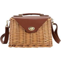 a brown wicker bag with an envelope on the front and strap around the shoulder