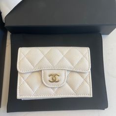 Brand New Chanel Classic Small Wallet Coco Mark Trifold Caviar Skin White. Come With Dust Bag, Box, Bag Material : Caviar Leather Color : White Chanel Small Flap Wallet, Luxury Compact Wallets For Daily Use, Luxury Compact Wallet With Coin Pocket, Designer Coin Purse With Interior Card Slots, Luxury Bifold Coin Purse With Coin Pocket, Luxury Rectangular Coin Purse For Travel, Luxury Bifold Coin Purse With Card Slots, Luxury Bifold Coin Purse With Interior Card Slots, Elegant Envelope Bag With Interior Card Slots